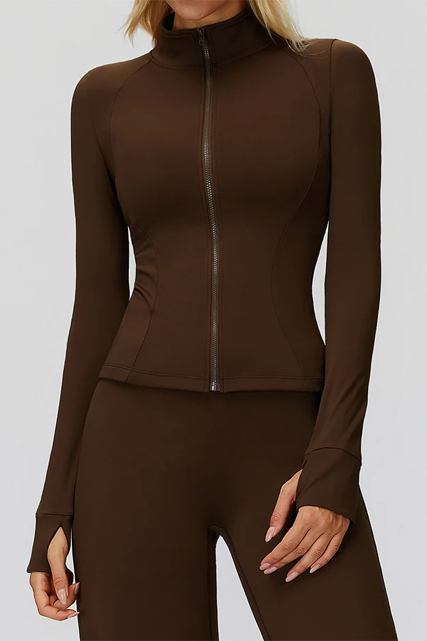 Model wearing an espresso zip-through training jacket